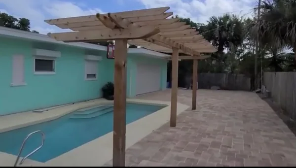 Poolside Pergola and Paver Area